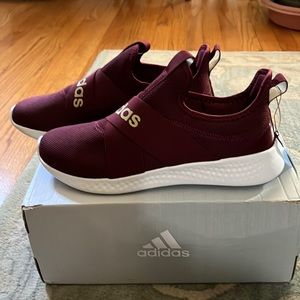 Adidas slip on tennies brand new.